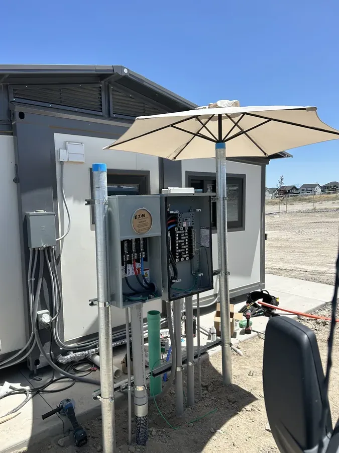Outdoor pedestal and service equipment for a commercial charging site