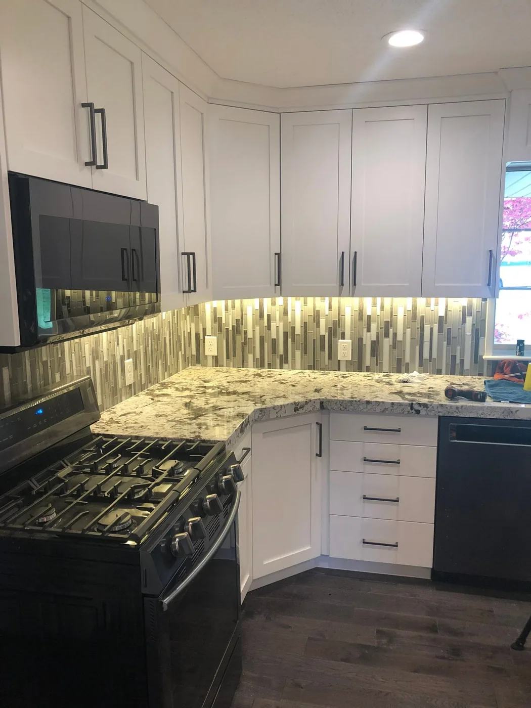 Kitchen with new under-cabinet lighting installed