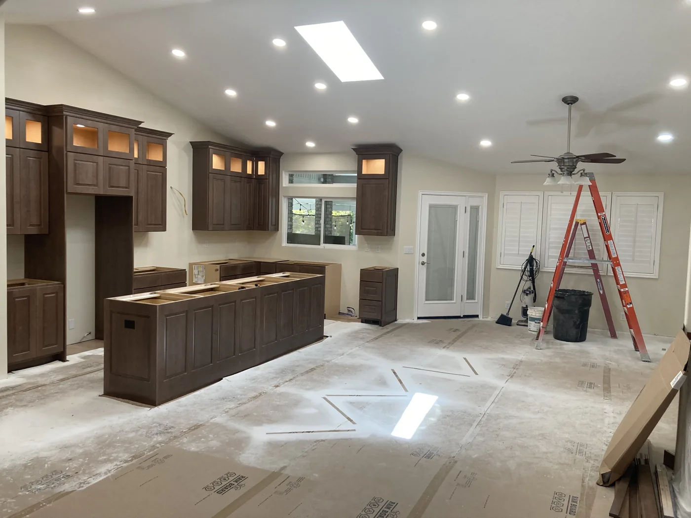 Home interior mid-rewire with new circuits and fixtures being installed